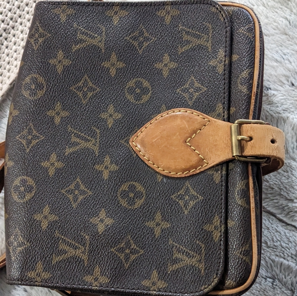 Authentic Louis Vuitton.